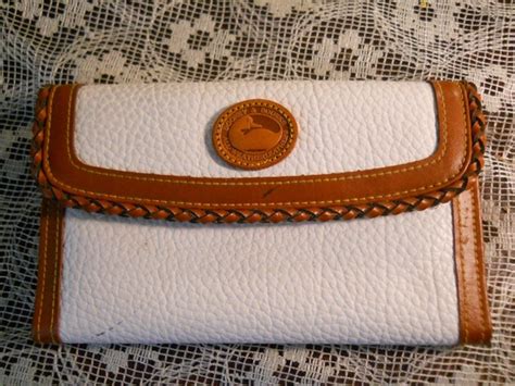 dooney & bourke fake tri-fold wallet|dooneys irish pub.